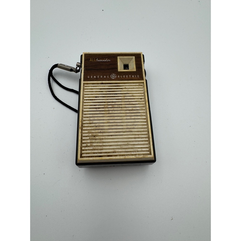 Vintage General Electric‎ GE Transistor AM Pocket Radio Wood Grain Hong Kong